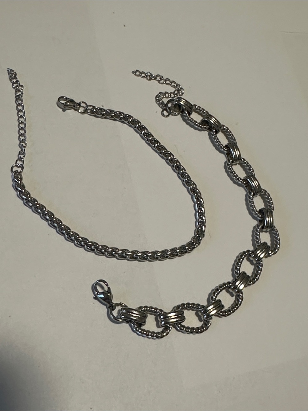Silver metal Chain link bracelet with coordinating rope like bracelet